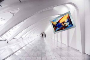 The NFT capture an oil painting on canvas. This abstract painting is colorful. There is a long white corridor and the painting is attached in 3D mode to the wall.